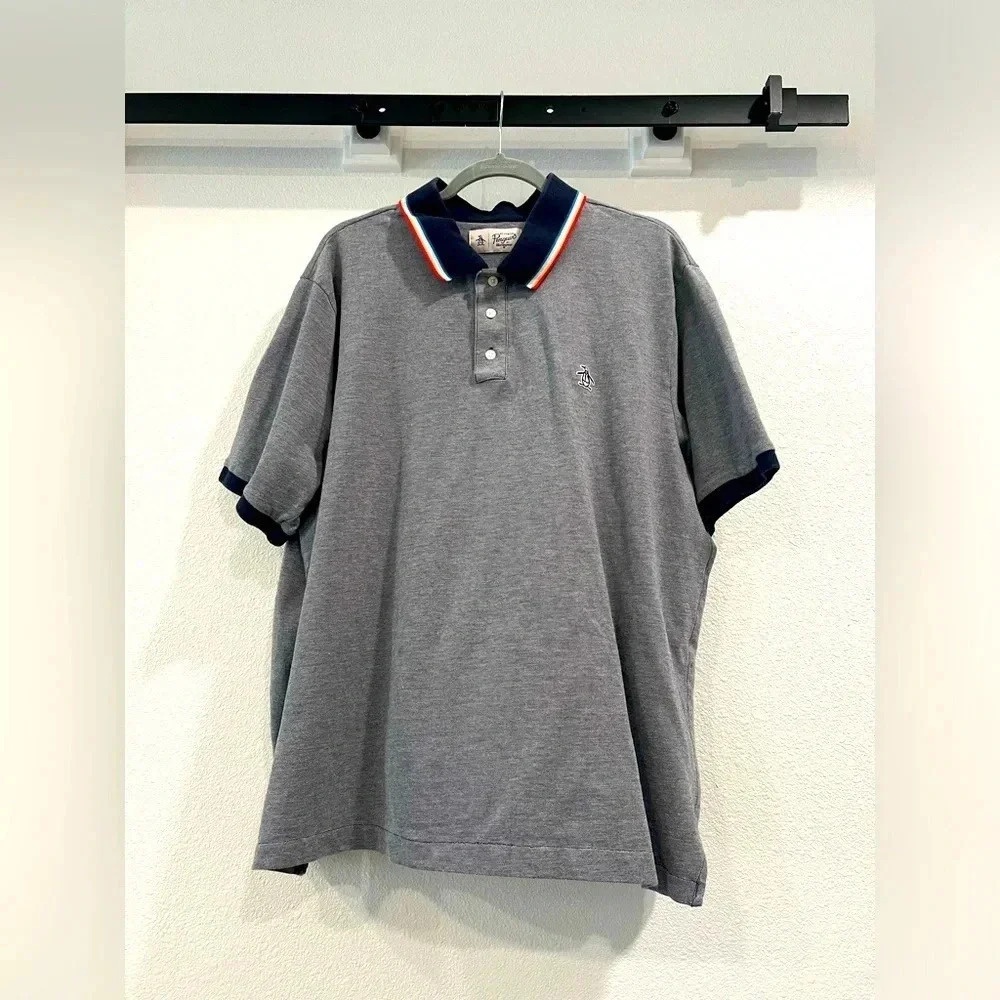 Original Penguin polo shirt. 2XL, Navy with multi colored edging on collar
